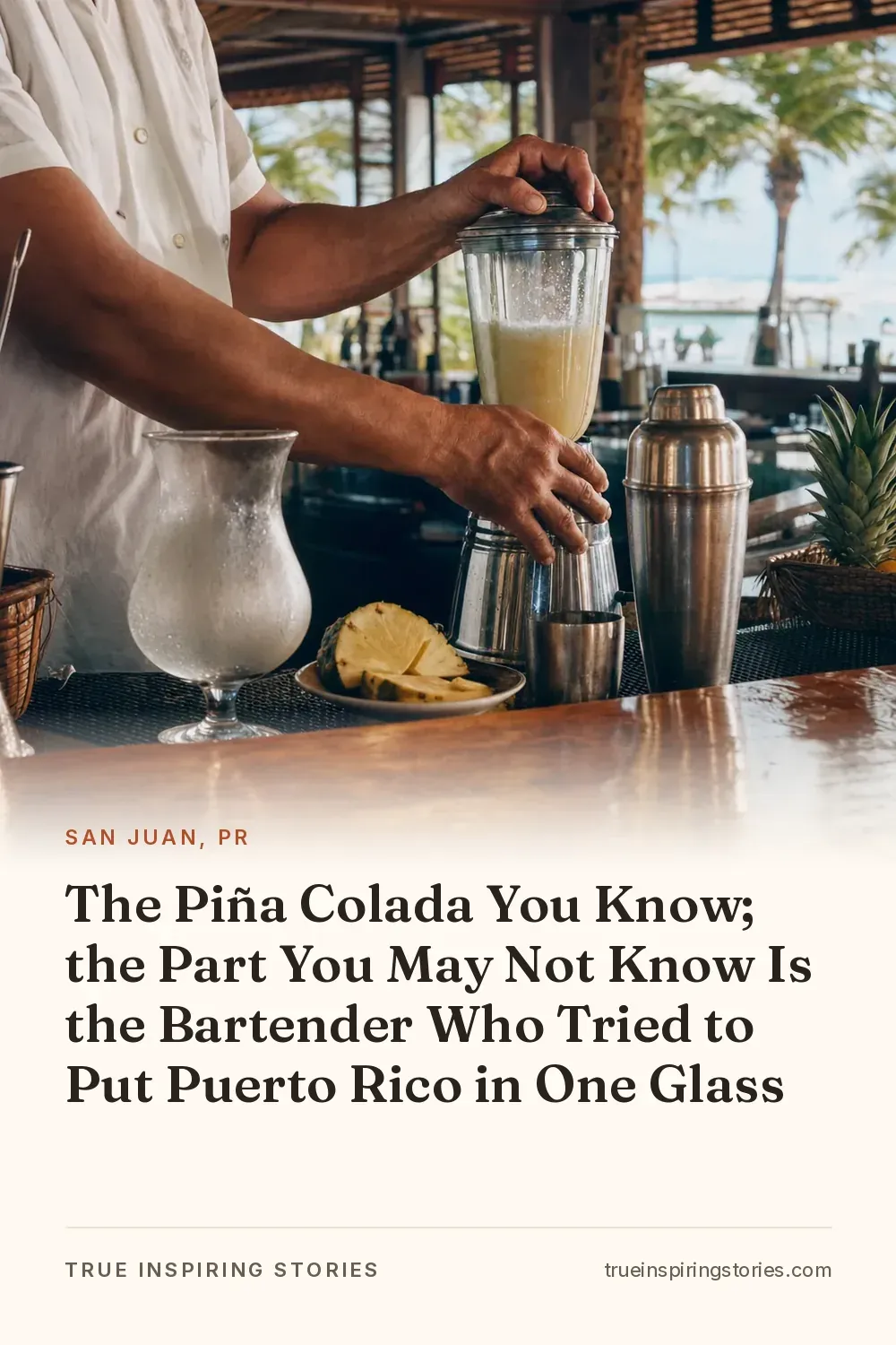 A bartender's hands prepare a creamy pineapple drink at a midcentury San Juan hotel bar.